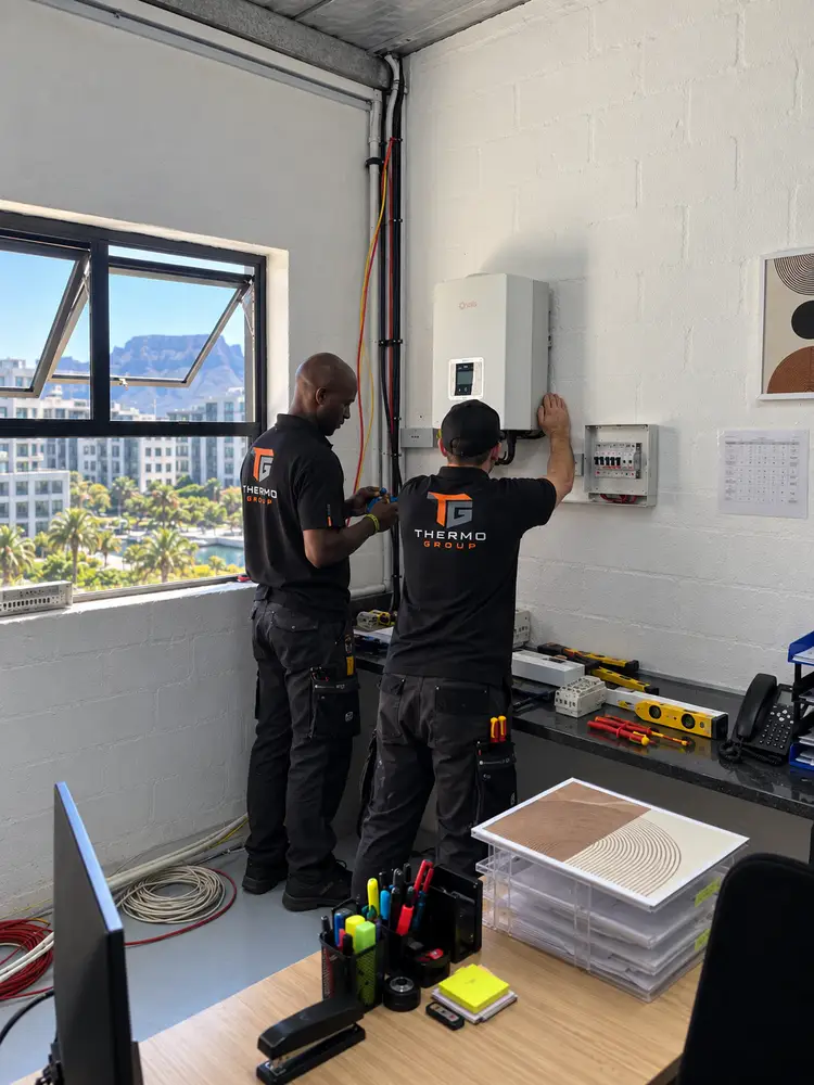 Thermo Group solar inverter installation in Century City, Cape Town, with Table Mountain visible in the background