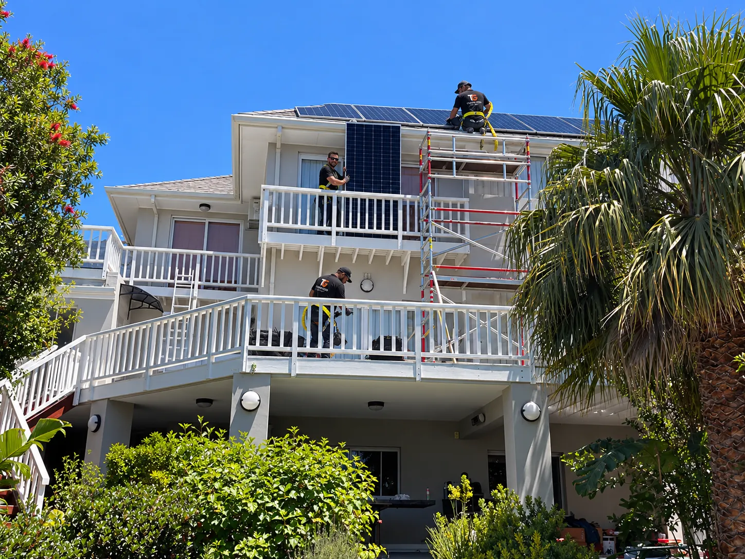 Thermo Group technicians installing solar panels on a Constantia rooftop