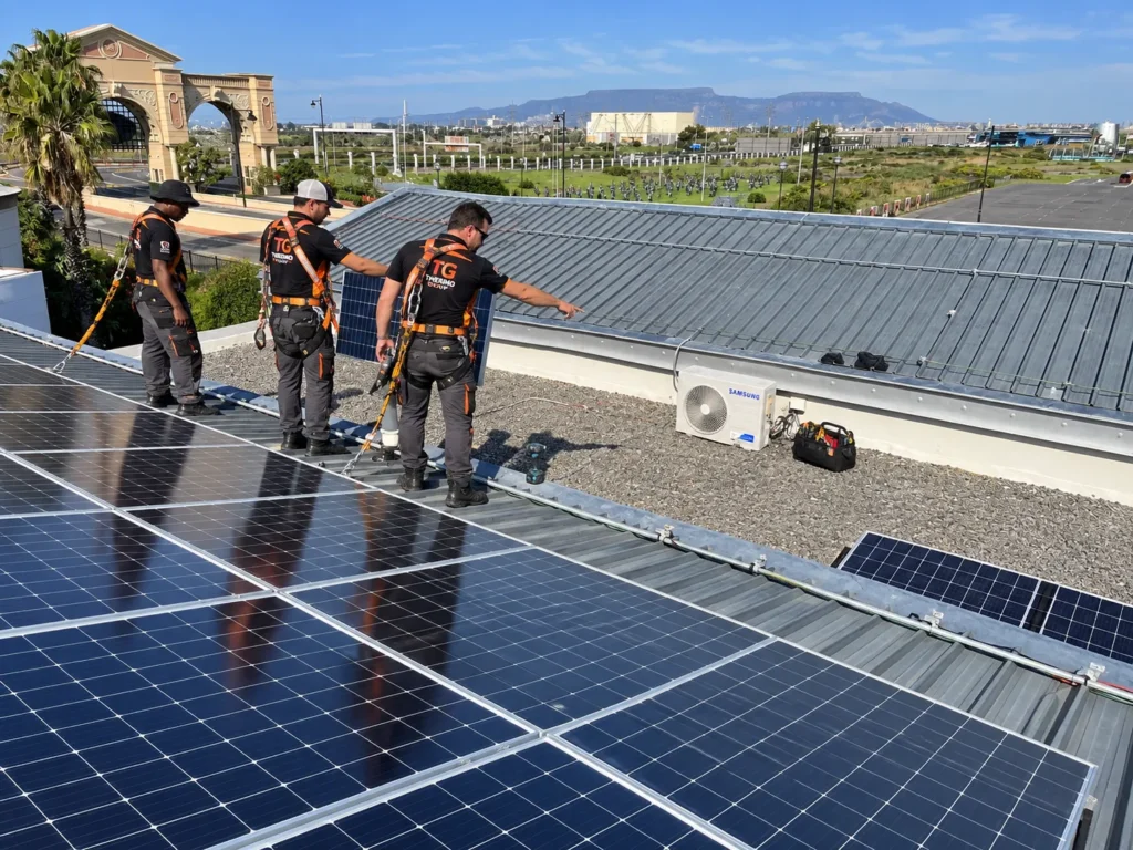Thermo Group solar installation team on a rooftop at a Century City business park in Cape Town