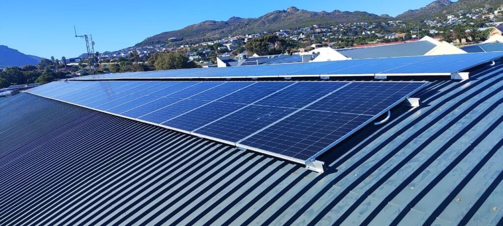 Thermo Group solar panel installation on a Hout Bay rooftop with mountain and valley view