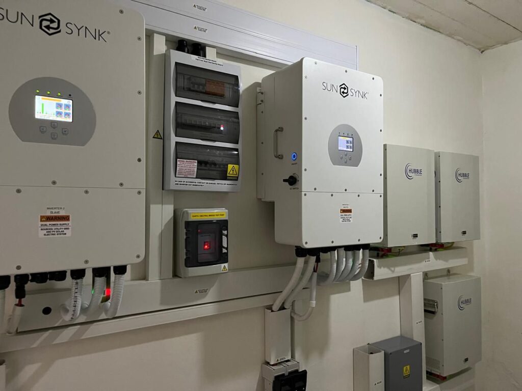 Two Sunsynk hybrid inverters with Hubble batteries and protection boards in Cape Town